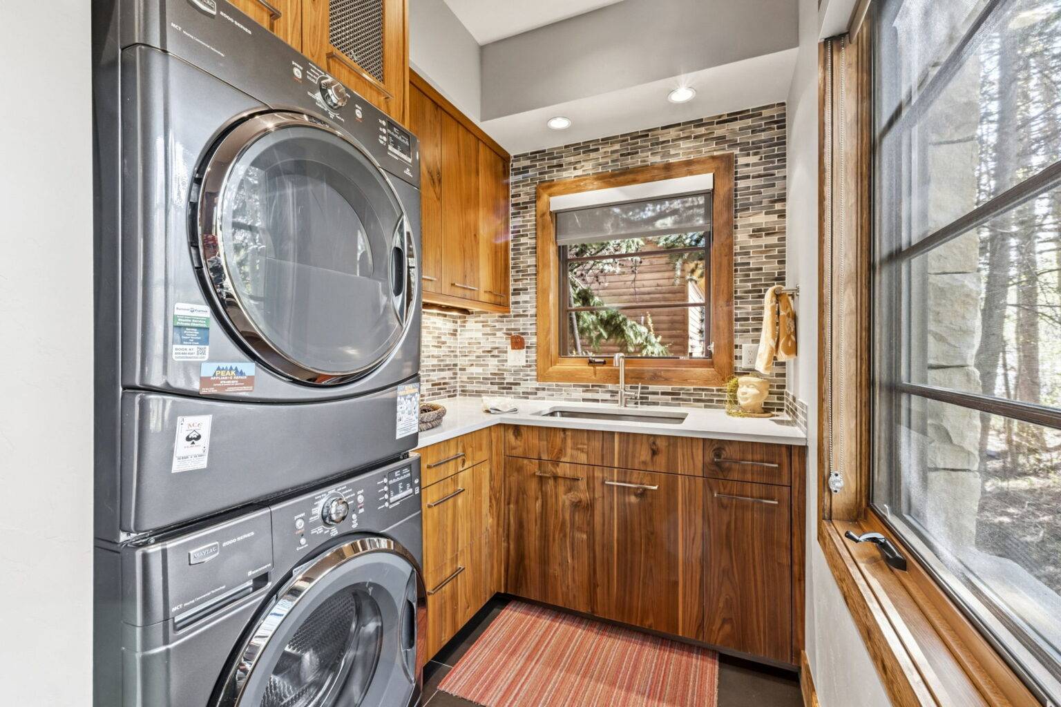 17 - Laundry - Laundry room with gorgeous cabinetry on Main Level